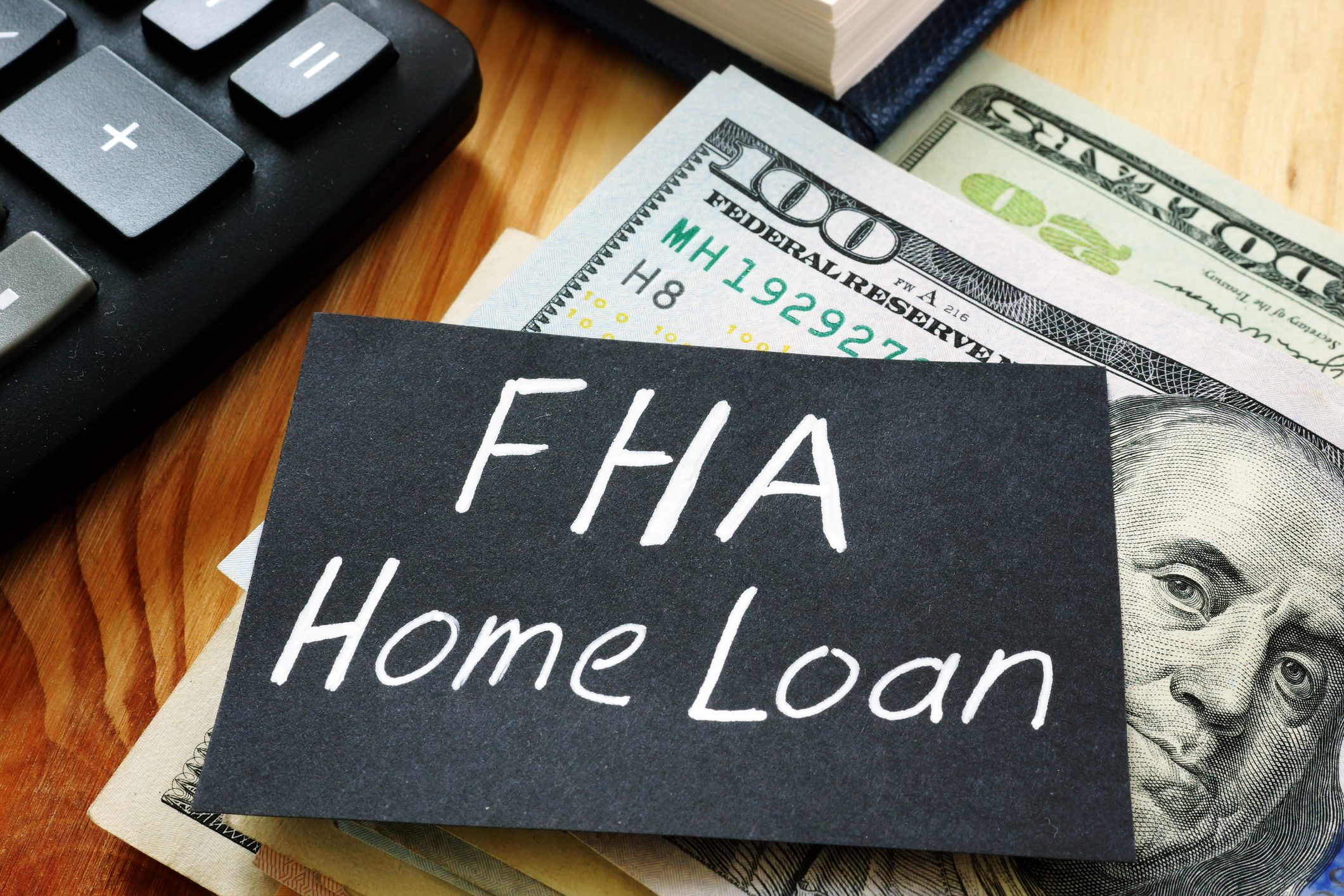 FHA home loan sign with cash.