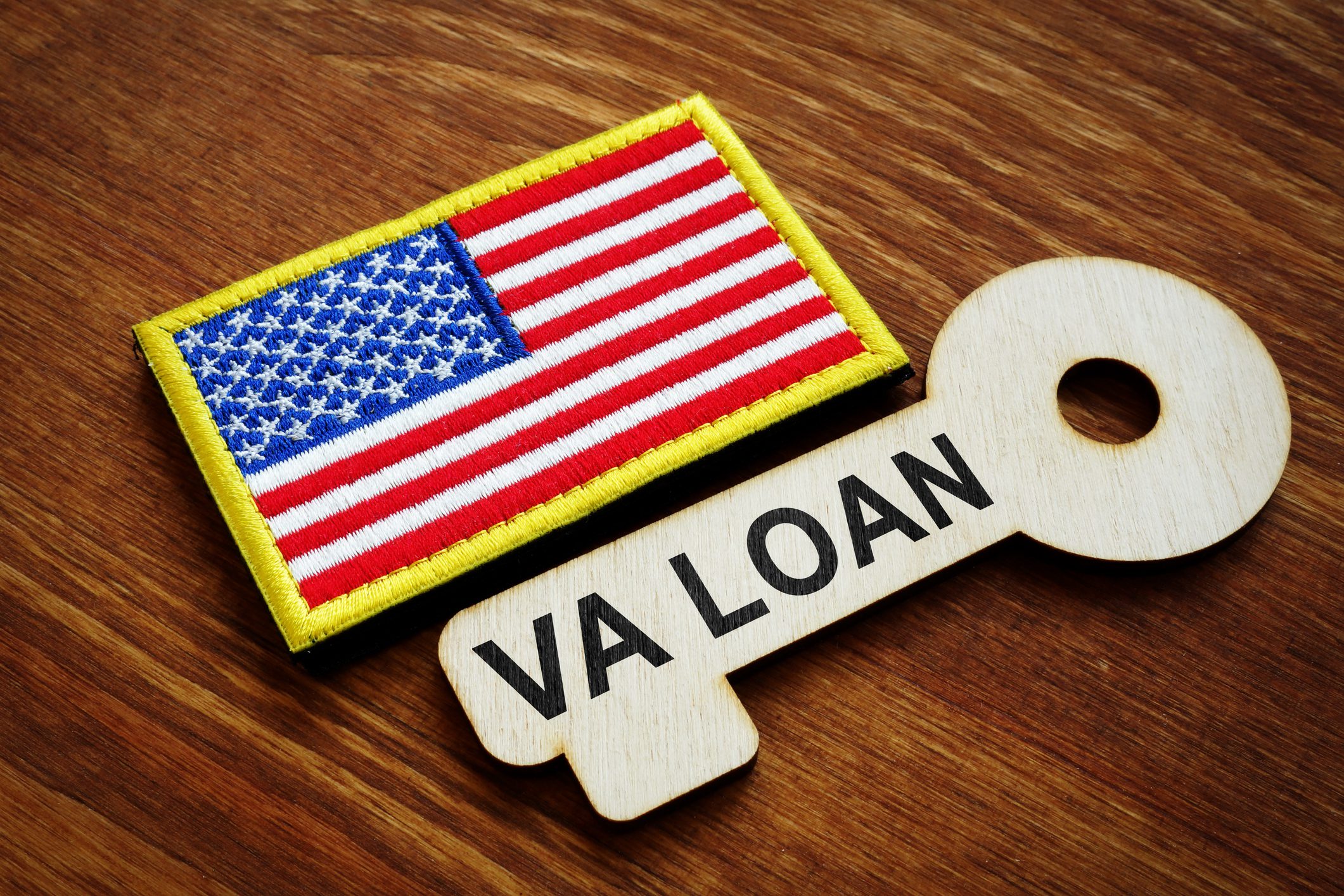 American flag patch and VA Loan key.